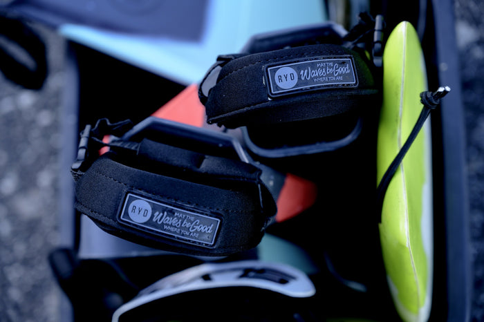 Close-up of RYD branded heel strap and buckle hardware